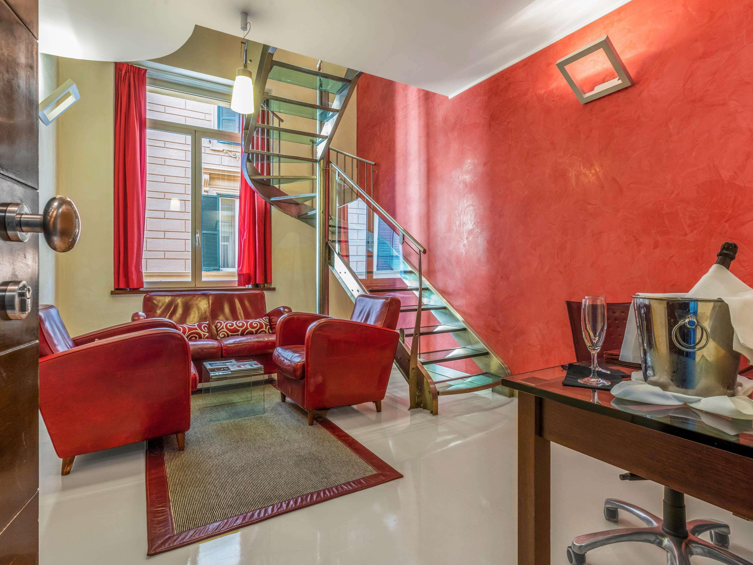 La Griffe Hotel Roma Exteriér fotografie A living room in a duplex apartment