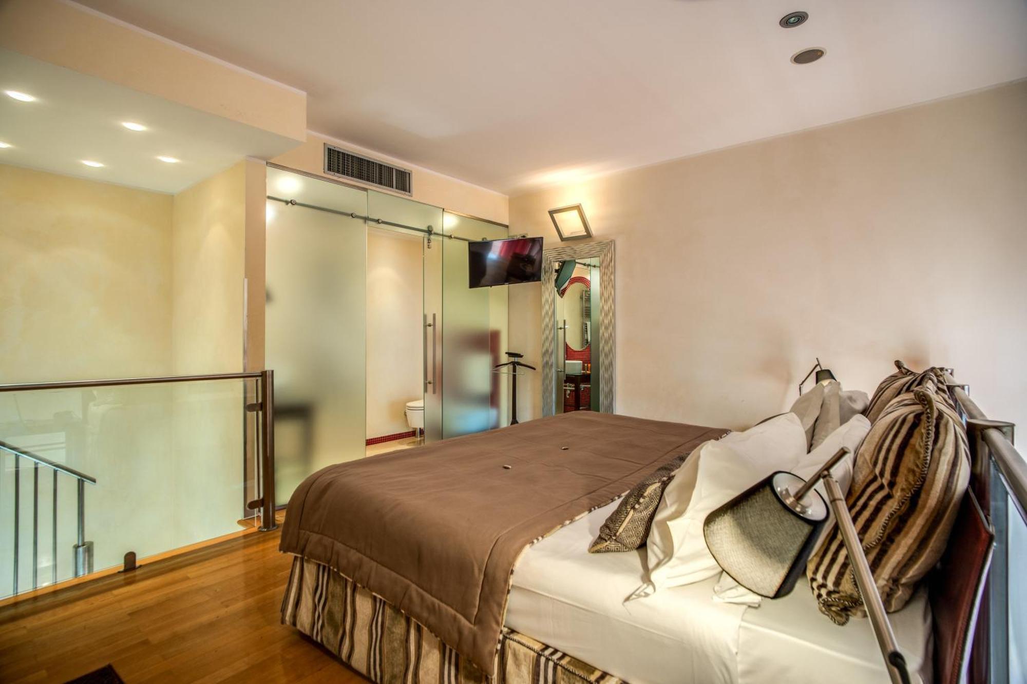 La Griffe Hotel Roma Exteriér fotografie A bedroom at the hotel